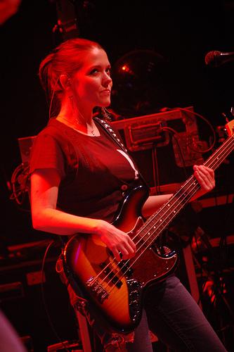 Annie playing bass