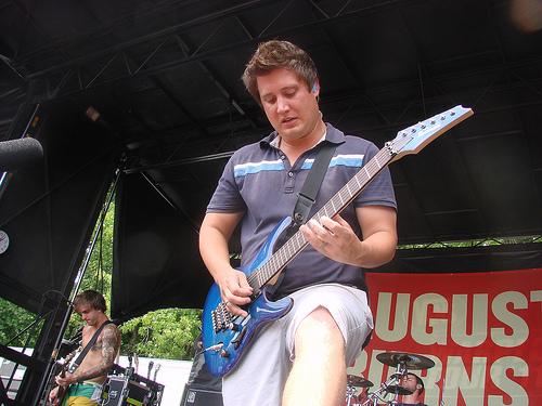 Brent Rambler playing guitar