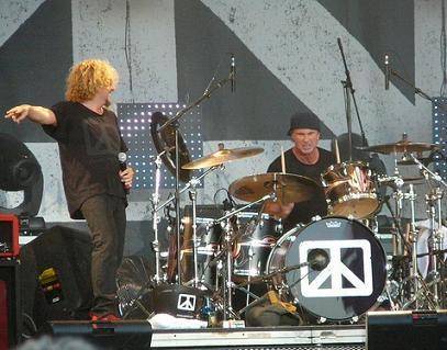 Chad Smith playing drums with Chickenfoot band