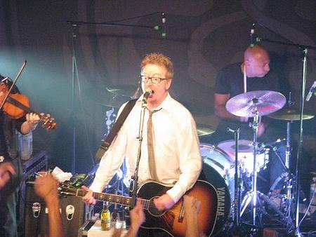 Dave on guitar with Flogging Molly