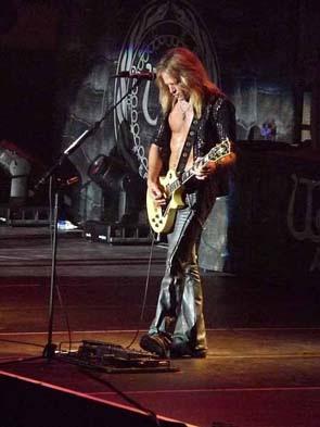 Doug playing guitar with Whitesnake