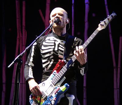 Flea playing bass with Red Hot Chili Peppers