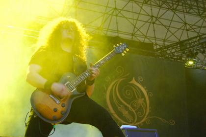 Fredrik Akesson playing guitar with Opeth