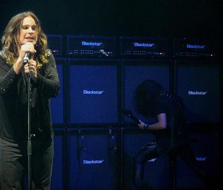 Gus G playing guitar with Ozzy
