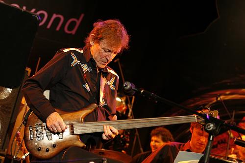 Jack Bruce playing bass live on stage