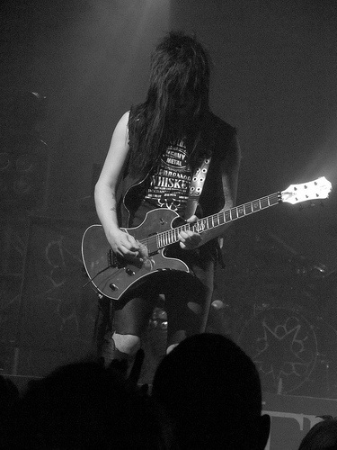Jake Pitts playing the guitar