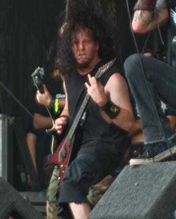 Mike playing guitar with DevilDriver