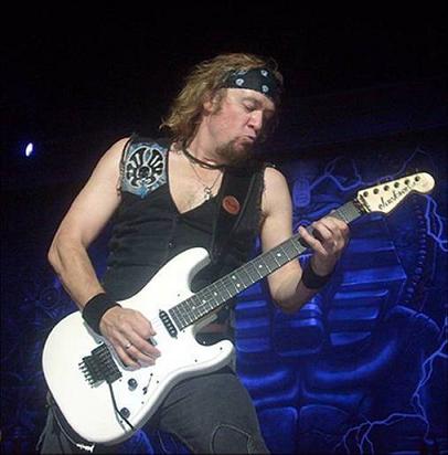 Adrian Smith on guitar