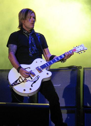 Billy Duffy on guitar