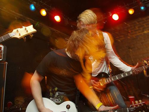 Eric playing guitar on stage