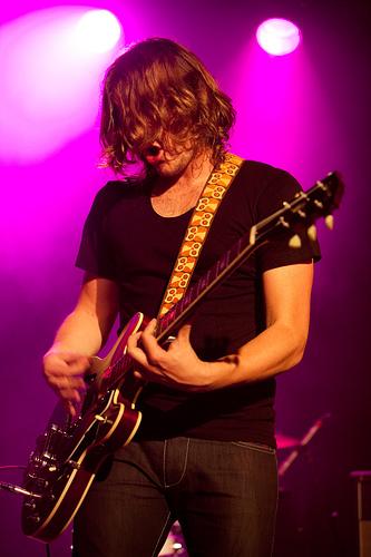 Jamie Cook Playing Guitar