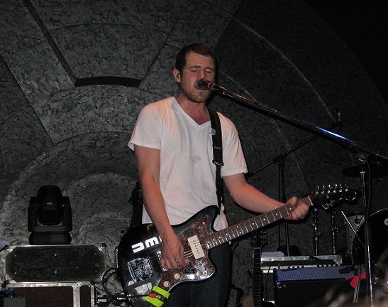 Jesse Lacey playing guitar with Brand New