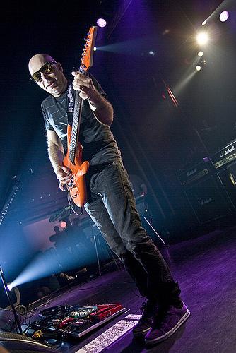 Joe Satriani playing guitar