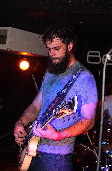 John Baizley playing guitar with Baroness