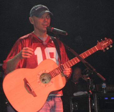 Kenny playing his acoustic