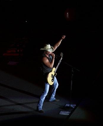 Kenny playing a Gibson guitar