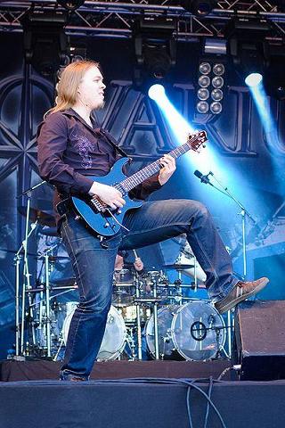 Matias playing guitar on stage