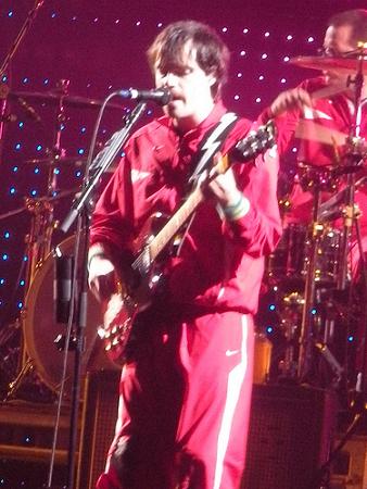 Rivers on guitar with Weezer