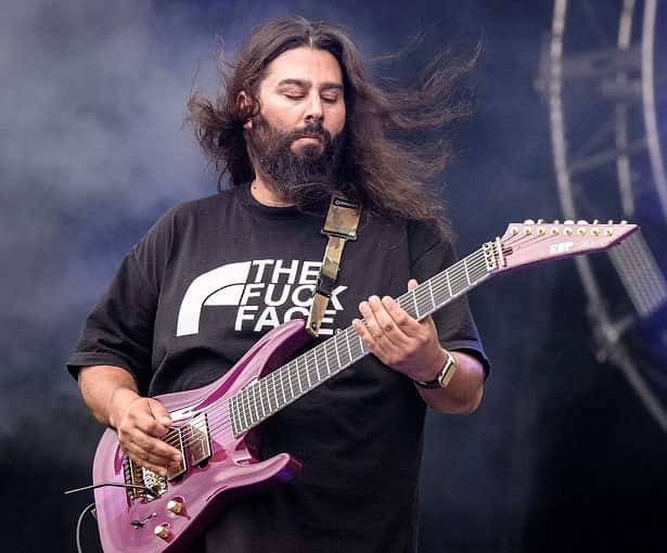 Stephen Carpenter playing guitar with Deftones