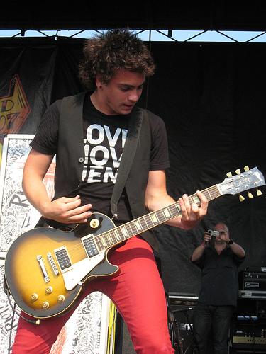 Taylor York playing guitar