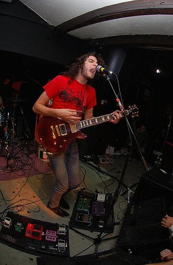 Thomas Erak on guitar