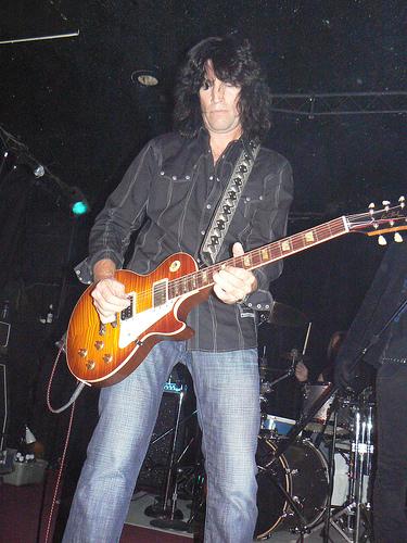 Tommy playing guitar
