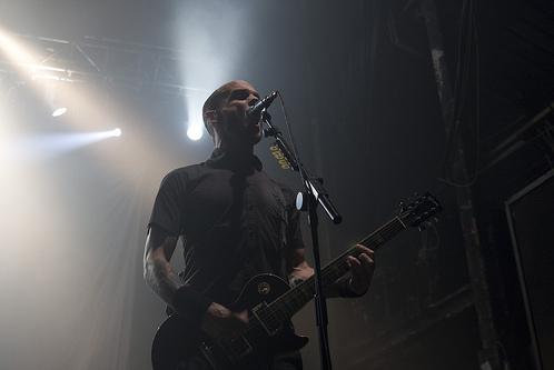 Zach Blair playing guitar on stage